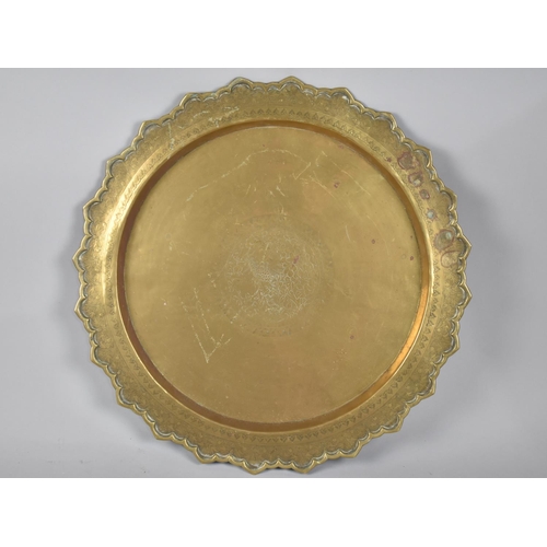 140 - A Circular Brass Charger/Tray, Probably Indian with Engraved Decoration depicting Gothic Bird, 47cms... 