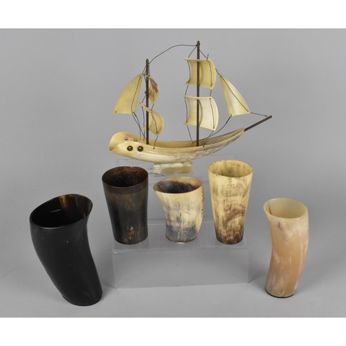 169 - A Collection of Various Horn Goblets together with a Two Masted Model of a Sailing Ship