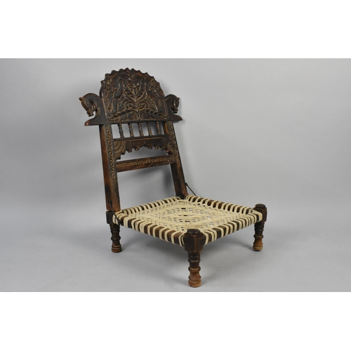 180 - A Folding Carved Wooden Chair Decorated with Birds and Horses