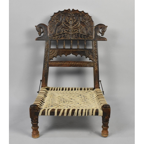 180 - A Folding Carved Wooden Chair Decorated with Birds and Horses