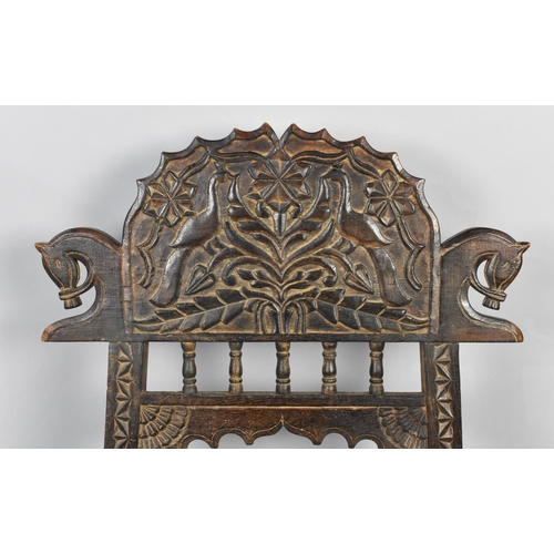 180 - A Folding Carved Wooden Chair Decorated with Birds and Horses