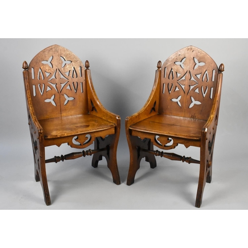 181 - A Pair of Late Victorian Gothic Revival Oak Side Chairs with Pierced Backs