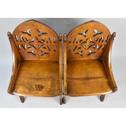 181 - A Pair of Late Victorian Gothic Revival Oak Side Chairs with Pierced Backs