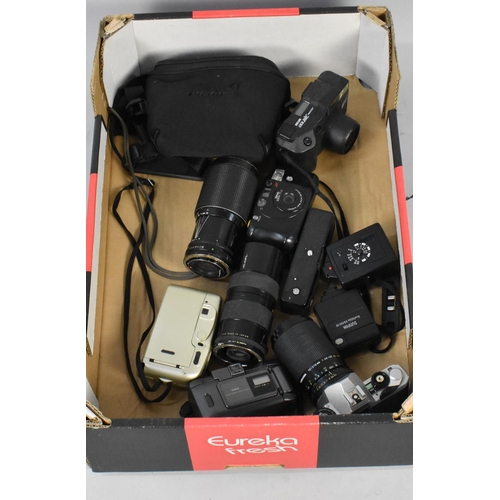 206 - A Box Containing Various Camera Bodies, Telescopic Lenses and Other Camera Accessories