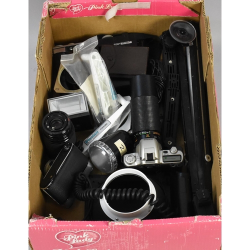 209 - A Box Containing Various Camera Bodies, Telescopic Lenses and Other Camera Accessories