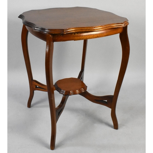 212 - An Edwardian Mahogany Shaped Top Occasional Table on Extended Cabriole Supports, 58cms Square