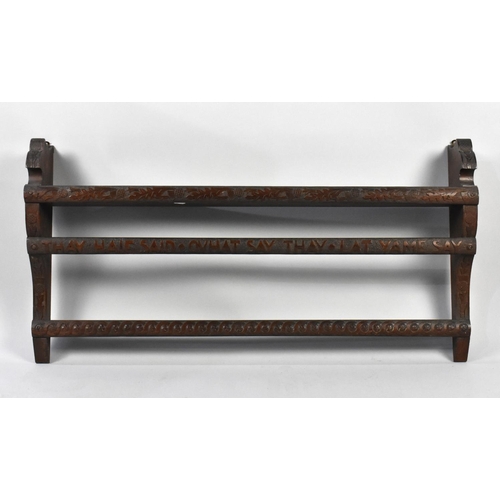 215 - A Carved Wooden Wall Hanging Shelf Unit Decorated with Scottish Thistles and Inscribed 