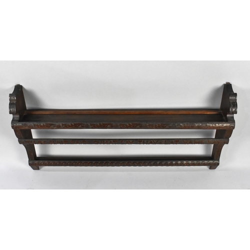 215 - A Carved Wooden Wall Hanging Shelf Unit Decorated with Scottish Thistles and Inscribed 