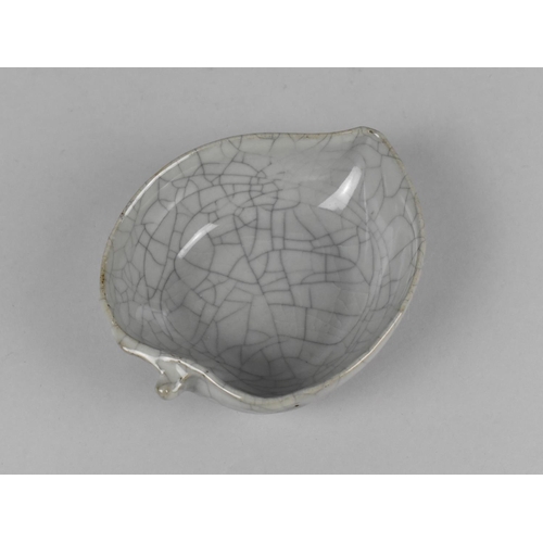 229 - A Chinese Celadon Crackle Glazed Brush Washer in the Form of a Leaf, 15cm x 3.5cm high