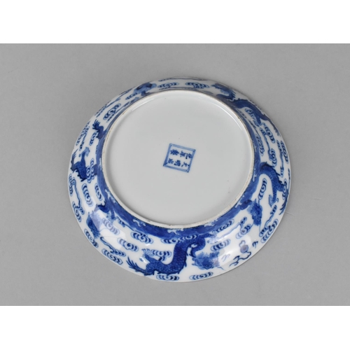 239 - A Chinese Porcelain Blue and White Dish Decorated with Central Double Mark with Scrolled Clouds and ... 