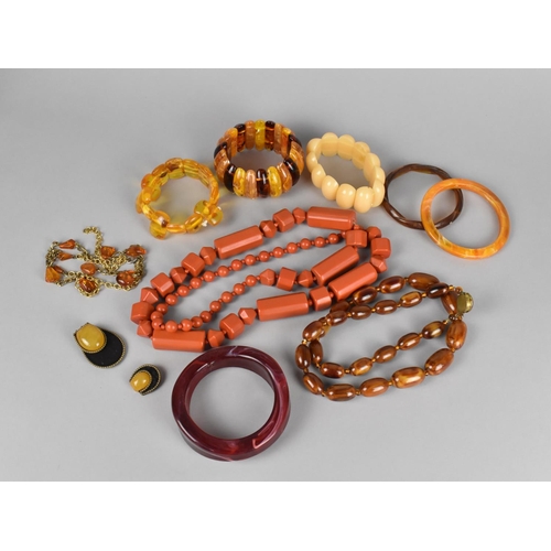 257 - A Collection of Various Amber and Other Bracelets, Necklaces, Bangles Etc