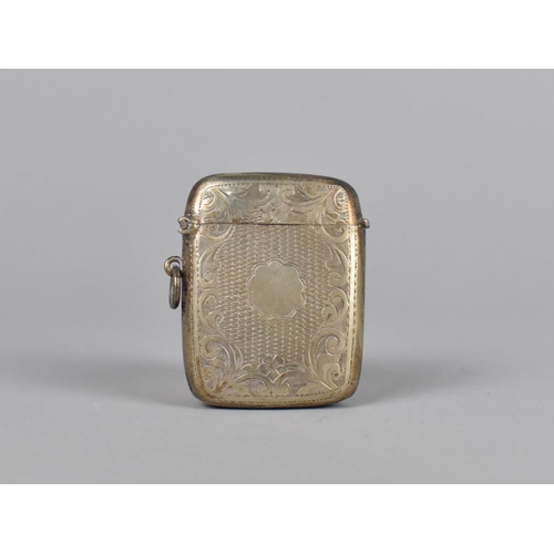 392 - A Late 19th Century Silver Plated Vesta Case with Chased Scrolled Decoration, 5cm high