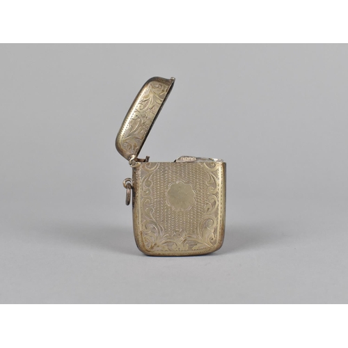 392 - A Late 19th Century Silver Plated Vesta Case with Chased Scrolled Decoration, 5cm high