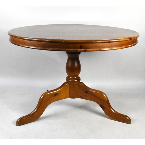 502 - A Mid/ Late 20th Century Stained Pine Circular Topped Dining Table, 106cms Diameter