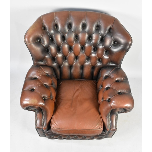 508 - A Vintage Button Upholstered Leather Wing Armchair