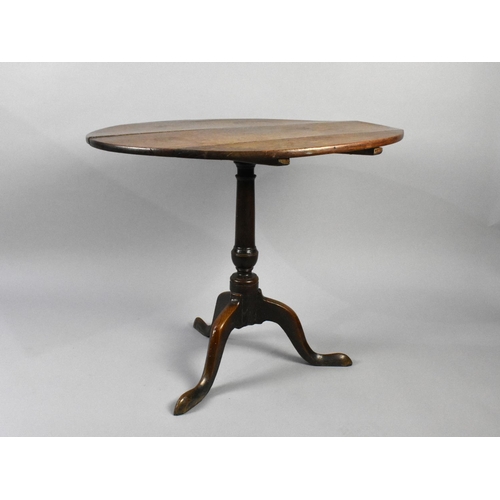 513 - A 19th Century Circular Oak Snap Top Tripod Table, Condition Issues, 84cms Diameter