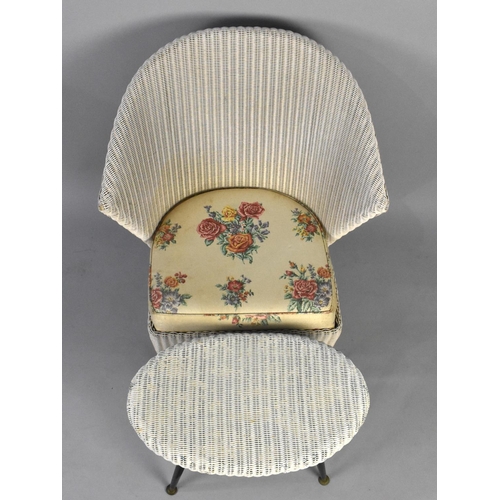 523 - A Mid 20th Century Loom Wing Nursing Chair and an Oval Dressing Table Stool