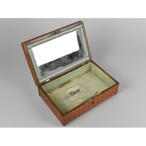 8 - A Late 19th/Early 20th Century Rectangular Wooden Jewellery Box with Studded Decoration to all sides... 