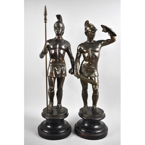 92 - A Pair of Tall Bronzed Spelter Figures of Classical Warriors, Both on Circular Socles, 58cms High