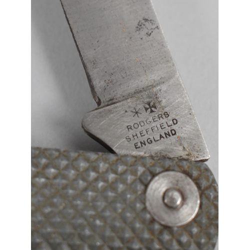 125 - A WWII Period Military Issue Clasp Knife with Chequered Grip, Single Blade, Tin Opener and Marlin Sp... 