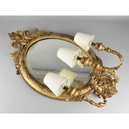 136 - A 19th Century Gilt Oval Wood and Plaster Wall Mirror with Tri-Candle Sconces Converted to Electrici... 