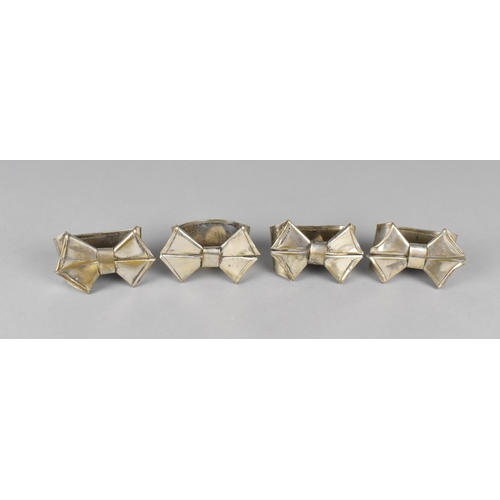 169 - A Set of Four Silver Plated Napkin Rings in the Form of Bows