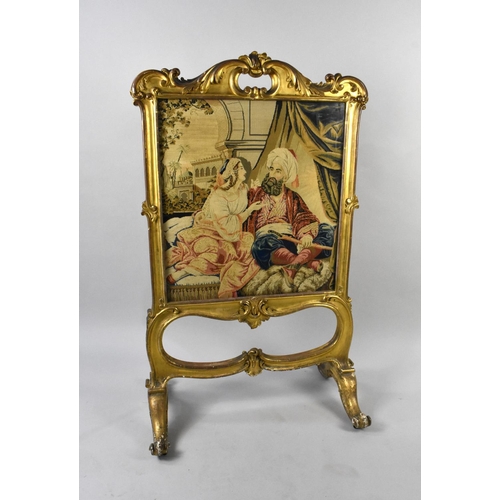 174 - A 19th Century Gilt Framed Rococo Style Fire Screen with Ornate Gesso Scroll and Leaf Decoration, Ta... 