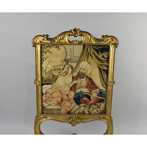 174 - A 19th Century Gilt Framed Rococo Style Fire Screen with Ornate Gesso Scroll and Leaf Decoration, Ta... 