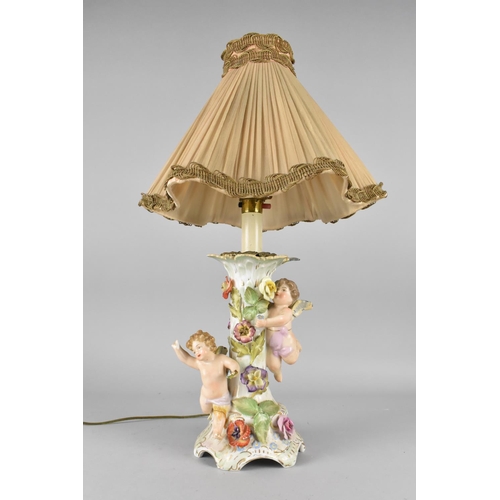 176 - A Continental Porcelain Lamp Base, Cherubs, Condition Issues