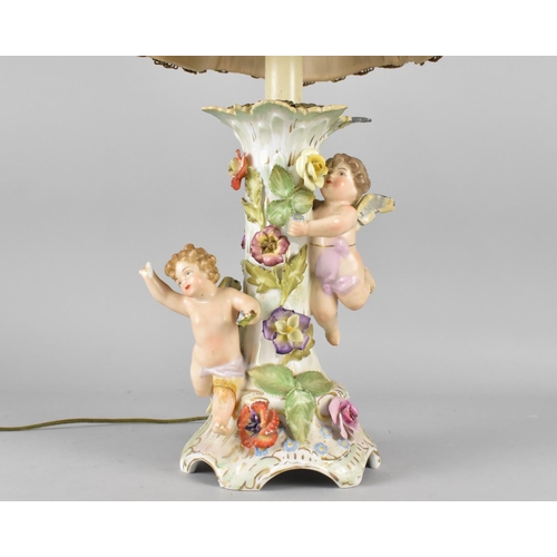 176 - A Continental Porcelain Lamp Base, Cherubs, Condition Issues