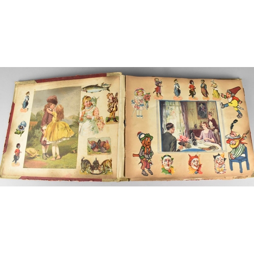 183 - An Early 20th Century Scrapbook Containing Various Cut Outs to include Louis Wain Type Cats, Cartoon... 