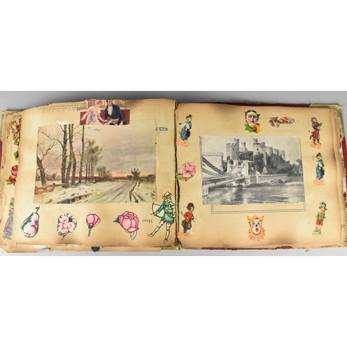 183 - An Early 20th Century Scrapbook Containing Various Cut Outs to include Louis Wain Type Cats, Cartoon... 