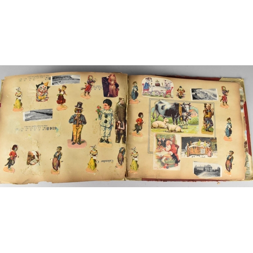 183 - An Early 20th Century Scrapbook Containing Various Cut Outs to include Louis Wain Type Cats, Cartoon... 