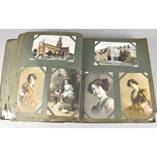 188 - An Edwardian Postcard Album Containing 290+ Postcards, Including Buildings, Risque, People, Flowers ... 