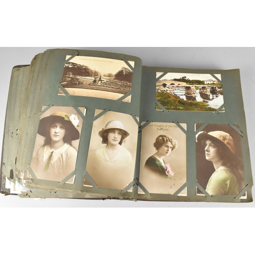 188 - An Edwardian Postcard Album Containing 290+ Postcards, Including Buildings, Risque, People, Flowers ... 