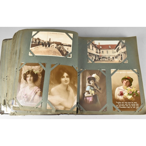 188 - An Edwardian Postcard Album Containing 290+ Postcards, Including Buildings, Risque, People, Flowers ... 