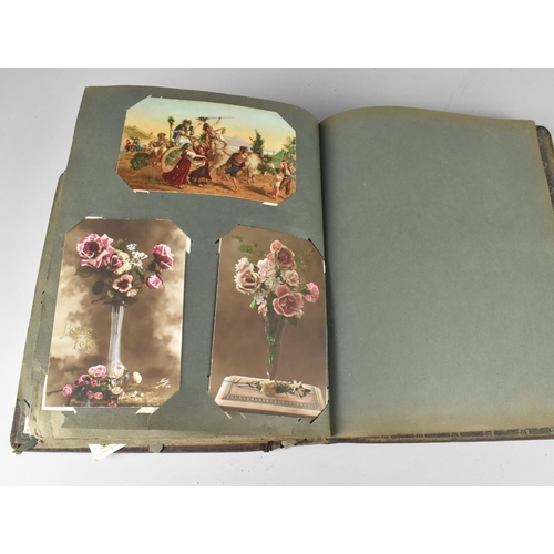 188 - An Edwardian Postcard Album Containing 290+ Postcards, Including Buildings, Risque, People, Flowers ... 