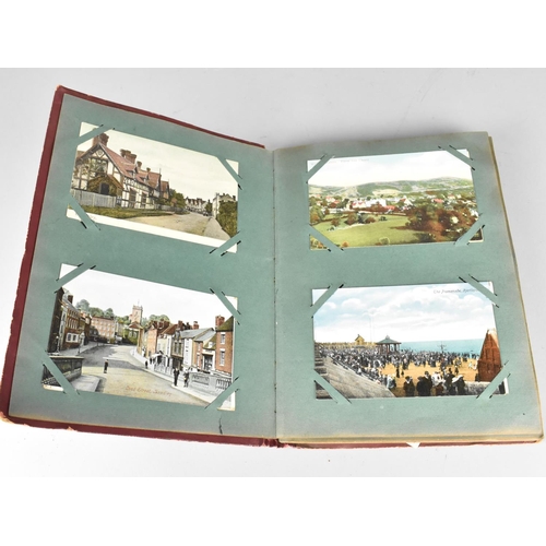 197 - An Edwardian Postcard Album Containing 100+ Postcards, Mainly Scenic and Buildings