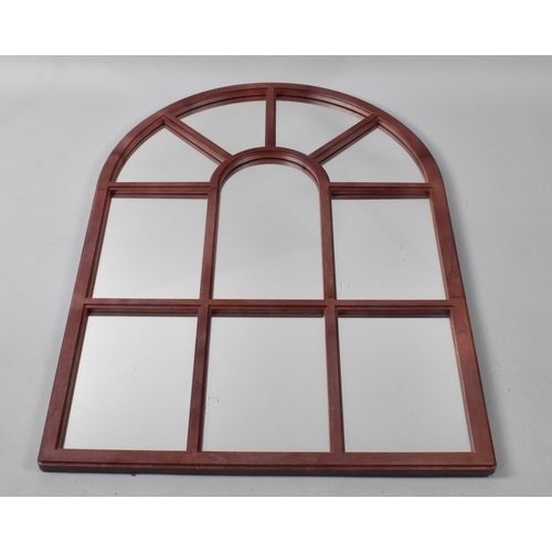 204 - An Arched Panelled Mirror, 73cms Wide