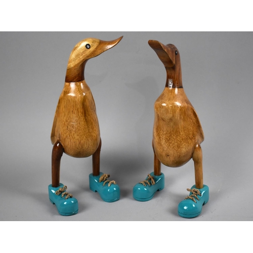 232 - A Pair of Wooden Anthropomorphic Ducks, Standing, with Blue Shoes, 25cms High