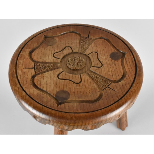 258 - A Carved Wooden Tripod Stool, Circular Top with Carved Rose Decoration, 36cms High