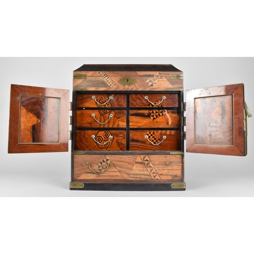 28 - A Oriental Inlaid Chest, Front Doors Revealing Six Drawers, Bottom Store and Hinged Lid with Fitted ... 