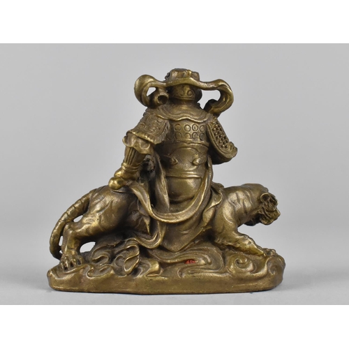 298 - A Bronze Study of Chinese Warlord Seated on Snarling Tiger, 15cms High