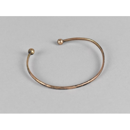 460 - A 9ct Gold Bangle, Sphere Terminating Ends 3.6gms