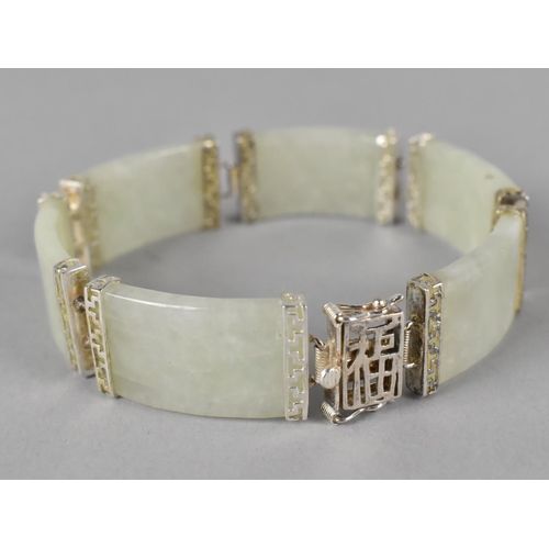 461 - A Chinese Jade and Silver Sectional Bracelet with Six Jade Panels