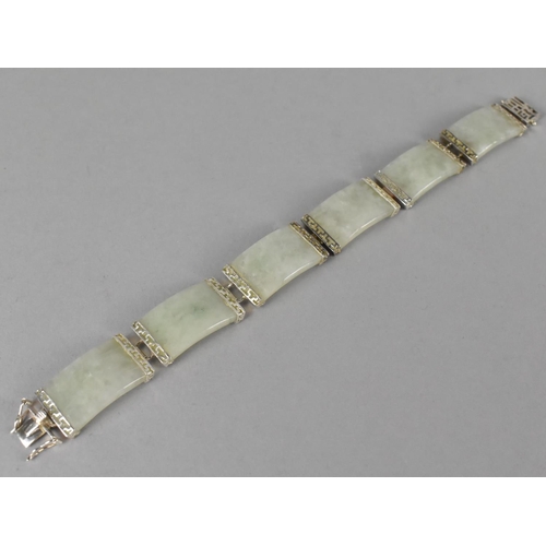 461 - A Chinese Jade and Silver Sectional Bracelet with Six Jade Panels