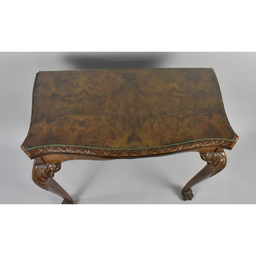 47 - A Mahogany Card Table on Cabriole Supports Culminating From Acanthus Leaf Tapering to Claw Feet, 76.... 