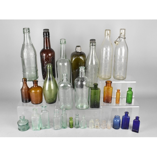 504 - A Collection of Various Glass Bottles Etc