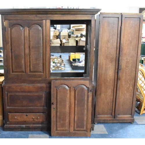 524 - A 18th/19th Century Oak Livery Cupboard, Having Moulded Corners Over a Pair of Paneled Covered Doors... 