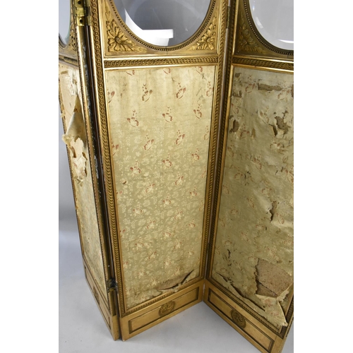 543 - A Victorian Giltwood and Gesso Silk Work Three Panel Dressing Screen having Glazed Windows, 49x180cm... 